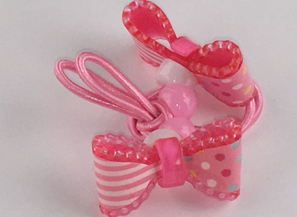 Elastics with patterned bow