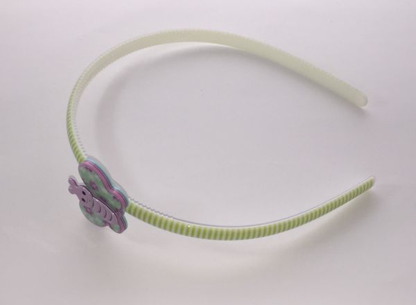 Patterned head band with butterfly shape