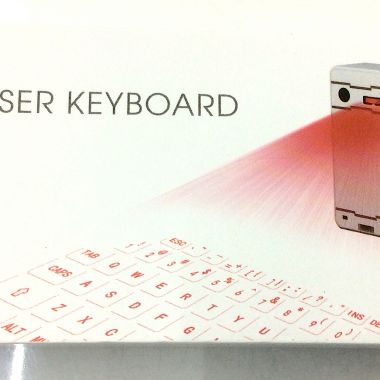 Laser keyboard with speaker