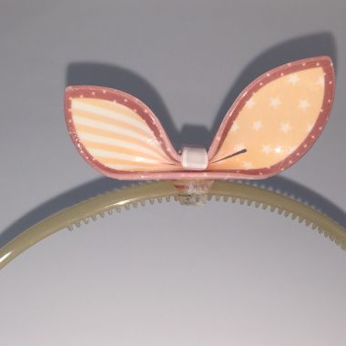 Head band with patterned bow