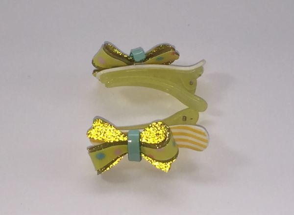 Crocodile clips with glittery bow