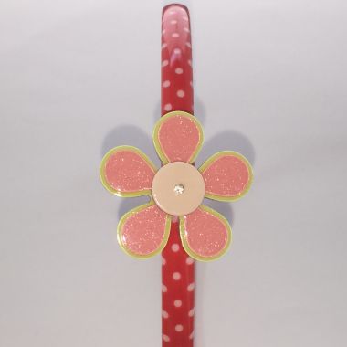 Polka dots patterned headband with flower shape