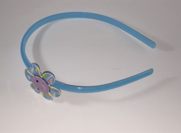 Head band with patterned flower shape