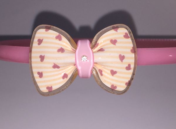 Head band with patterned bow