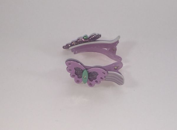 Patterned crocodile clip with butterfly