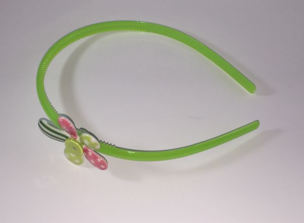 Head band with patterned flower shape