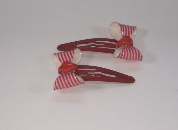 Snap clip with patterned bow
