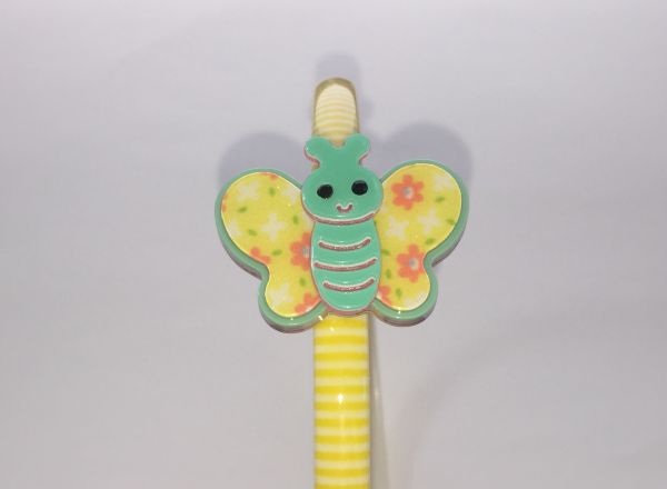 Patterned head band with butterfly shape