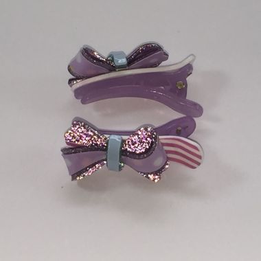 Crocodile clips with glittery bow