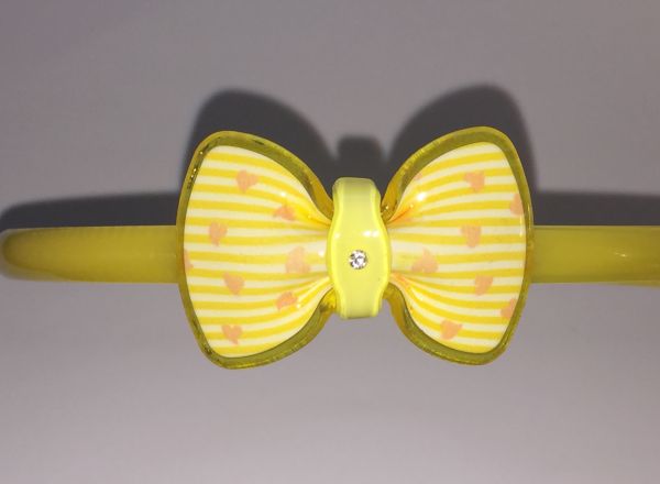 Head band with patterned bow