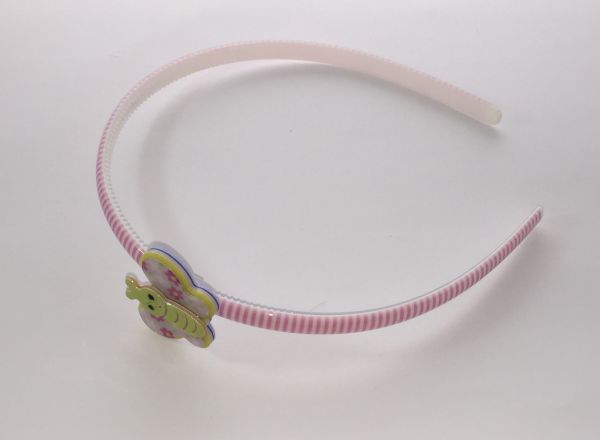 Patterned head band with butterfly shape