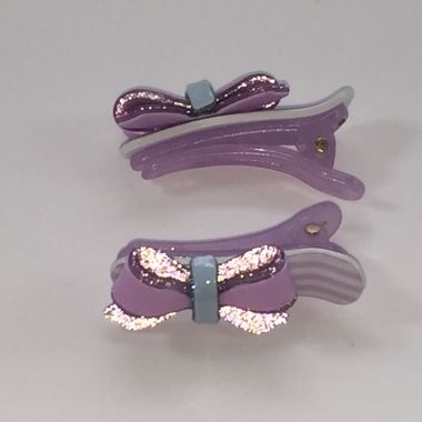 Crocodile clips with glittery bow