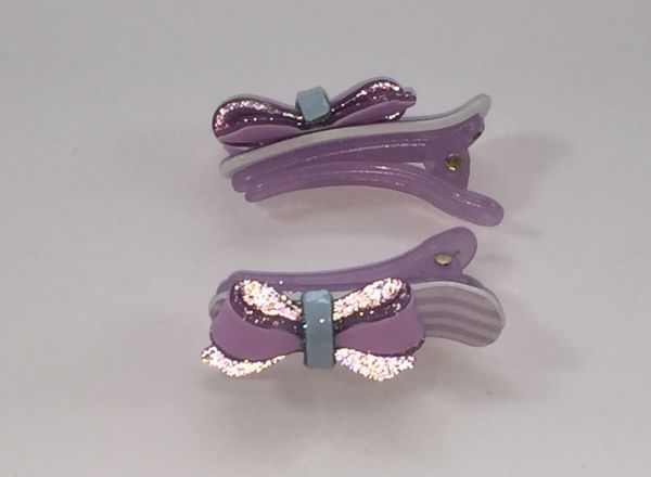 Crocodile clips with glittery bow