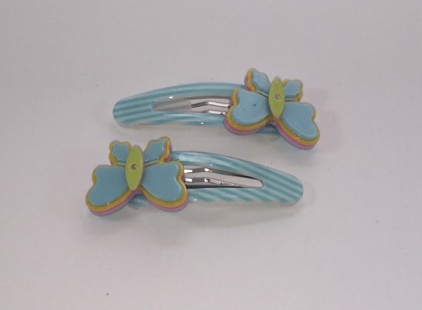 Patterned snap clip with butterfly